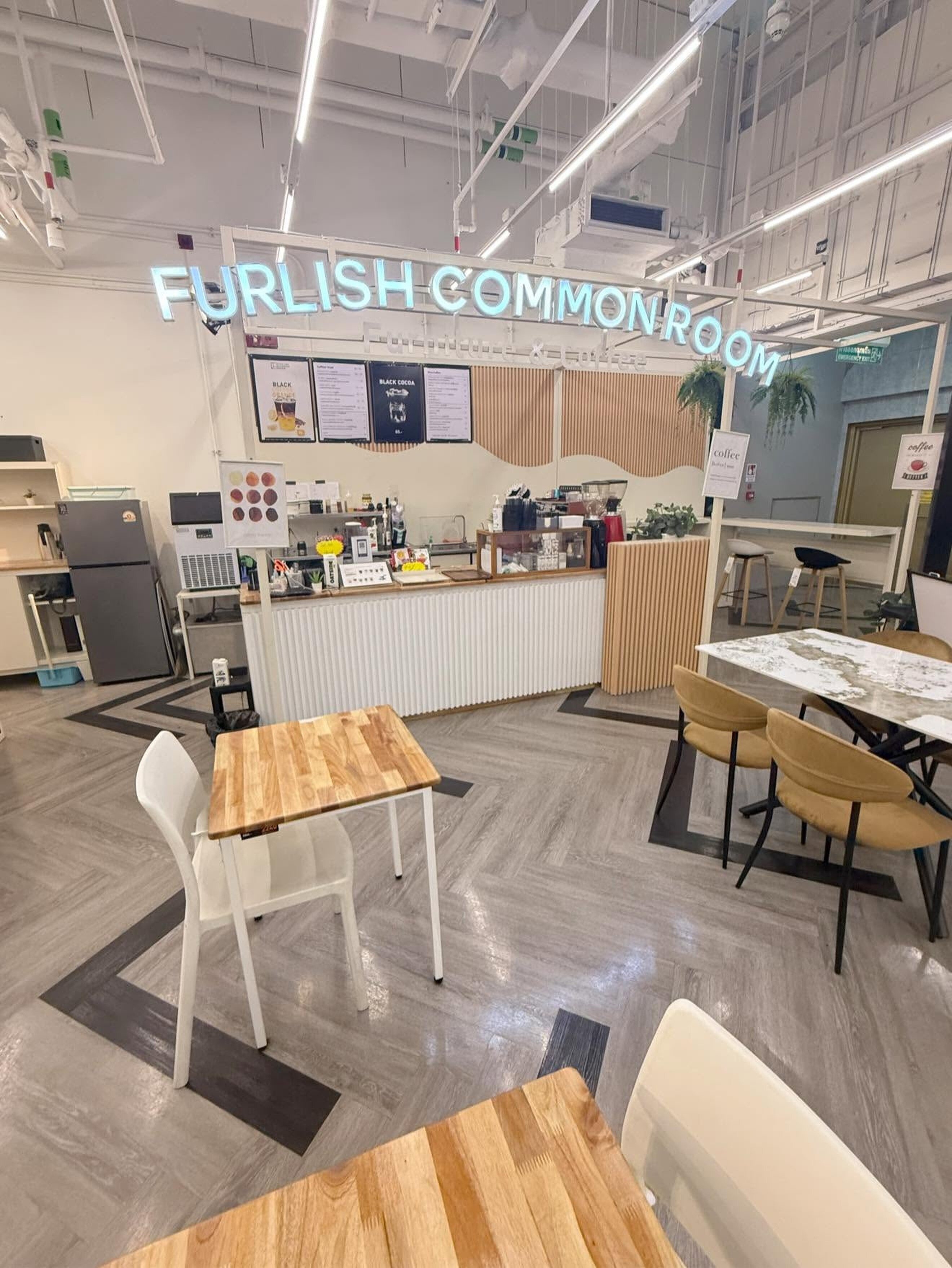 Furlish Common Room seating area with showroom furniture